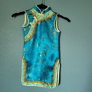 Vibrant Blue Cheongsam with Gold And Yellow Accents 2T